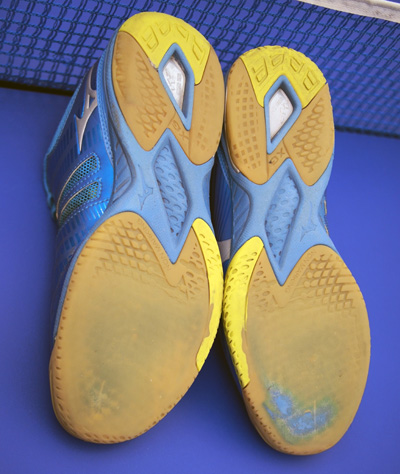 worn out badminton shoe